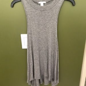 Grey tank with deep arm cut